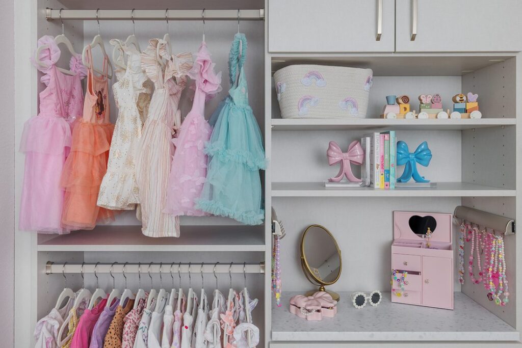 Custom reach-in closet system with ODI cabinetry by Closet Concepts