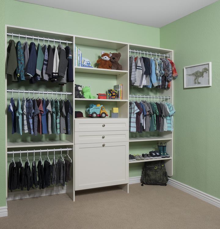 Custom reach-in closet system with ODI cabinetry by Closet Concepts