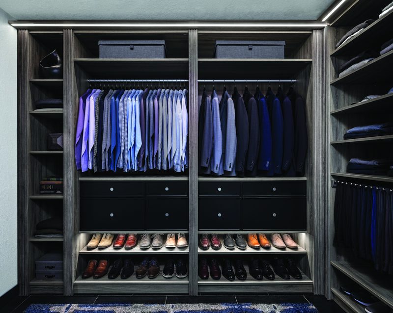 Custom walk-in closet with ODI cabinetry, designed and installed by Closet Concepts