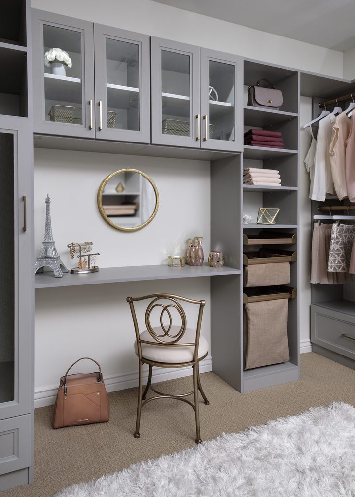 Custom walk-in closet with ODI cabinetry, designed and installed by Closet Concepts