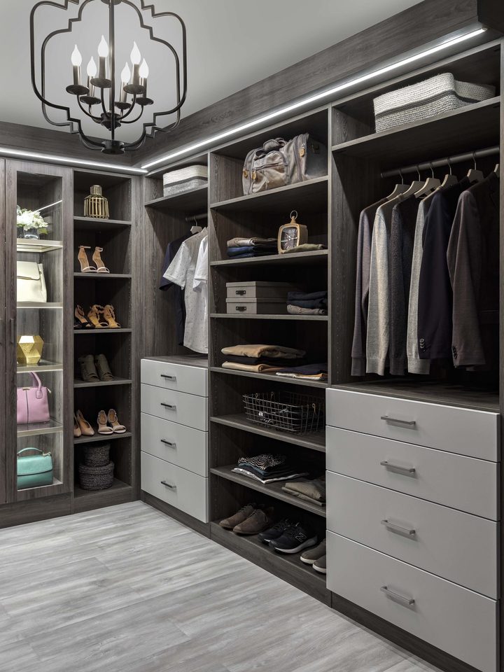 Custom walk-in closet with ODI cabinetry, designed and installed by Closet Concepts