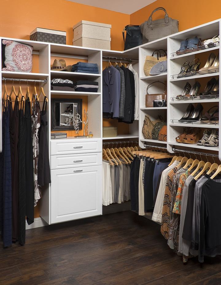 Custom walk-in closet with ODI cabinetry, designed and installed by Closet Concepts
