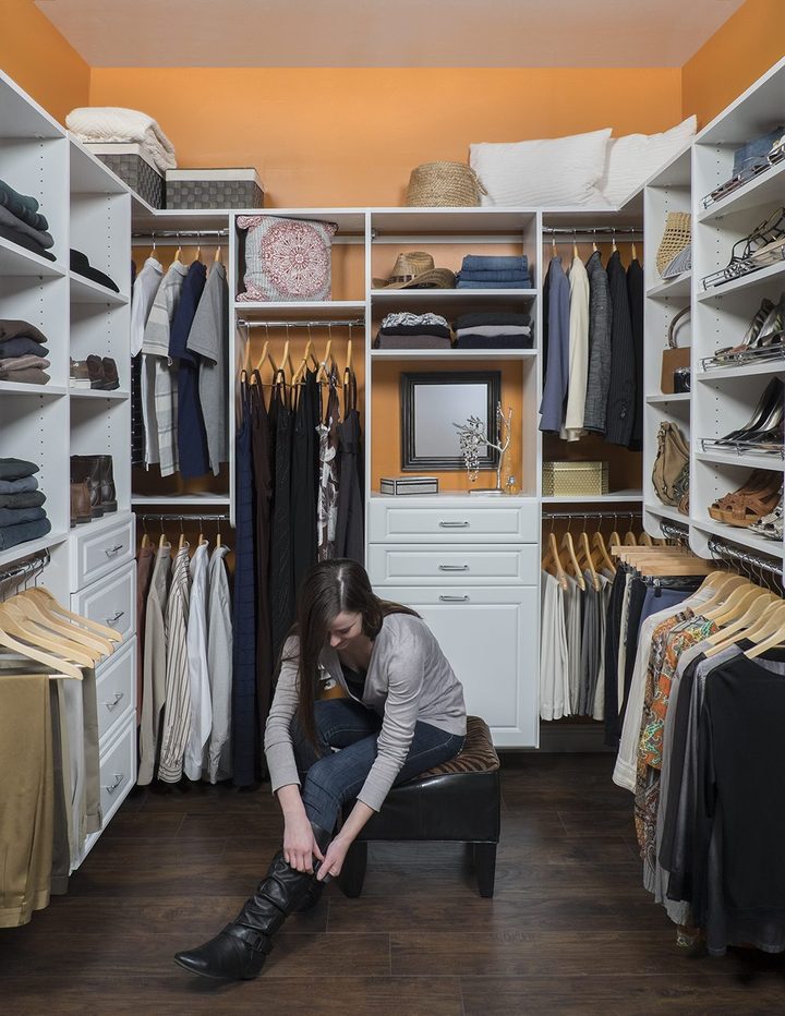 Custom walk-in closet with ODI cabinetry, designed and installed by Closet Concepts